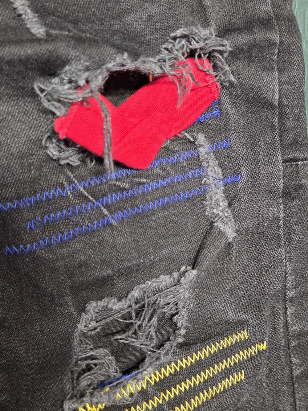 **Black Distressed Men’s Jeans with Color Patch Accents** - Picture 13 of 14